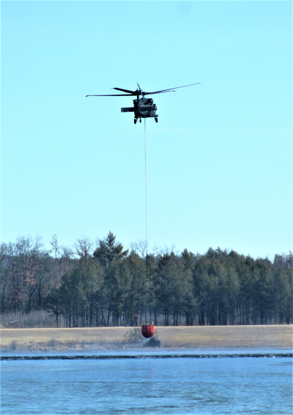 Federal, state agencies partner for fire-suppression training with UH-60 Black Hawks at Fort McCoy