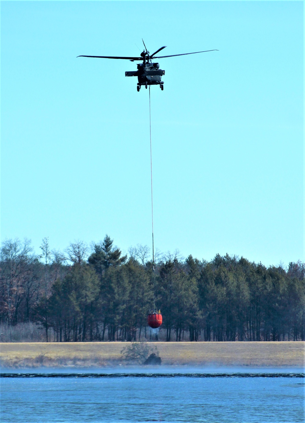 Federal, state agencies partner for fire-suppression training with UH-60 Black Hawks at Fort McCoy