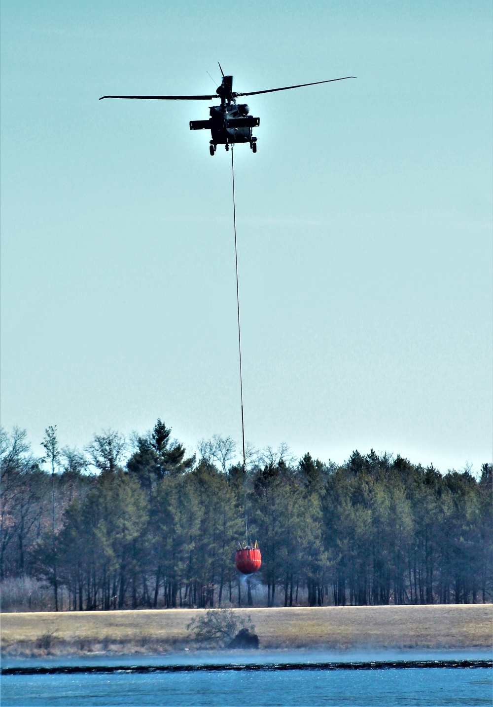 Federal, state agencies partner for fire-suppression training with UH-60 Black Hawks at Fort McCoy