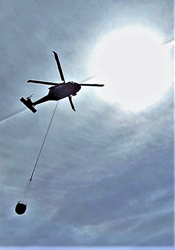 Wisconsin Army National Guard UH-60 Black Hawk crew holds Bambi bucket training at Fort McCoy