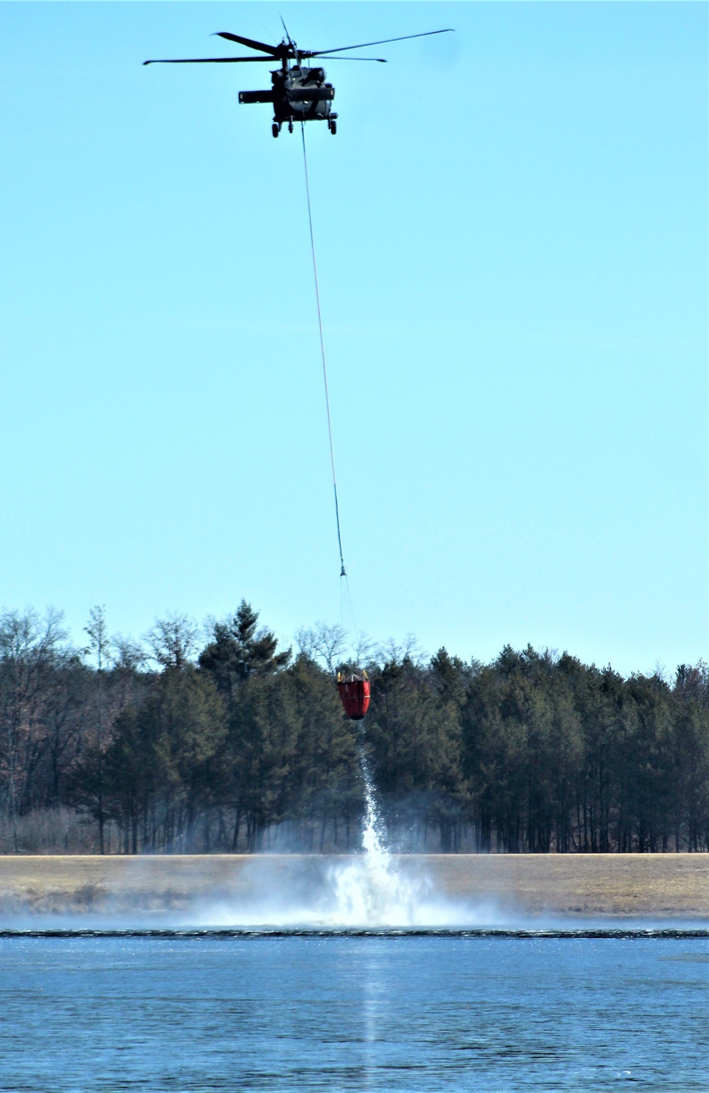 Wisconsin Army National Guard UH-60 Black Hawk crew holds Bambi bucket training at Fort McCoy