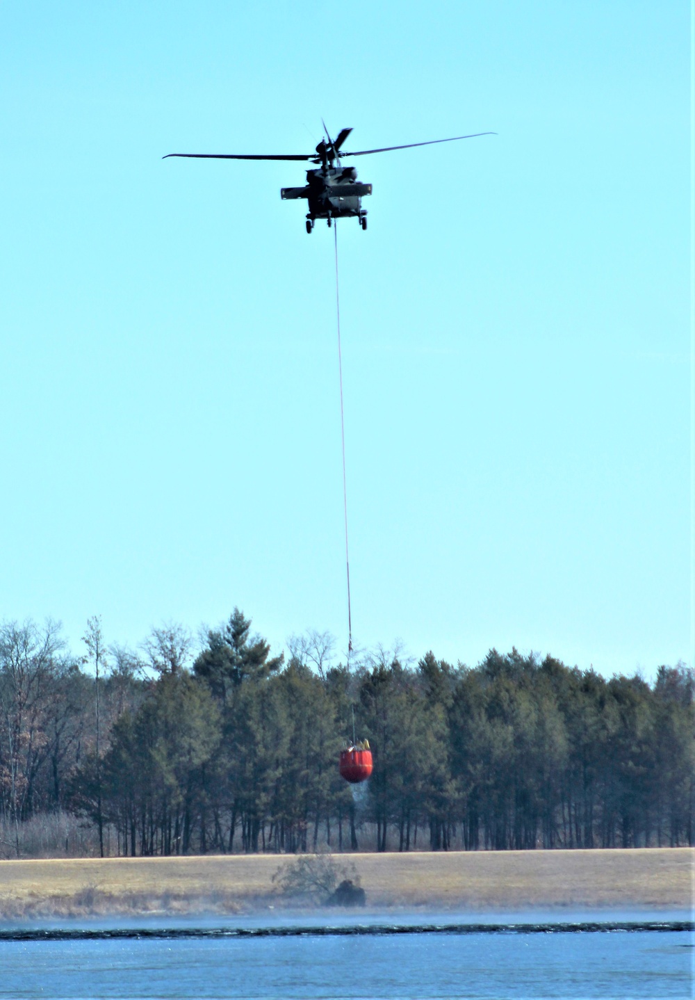 Wisconsin Army National Guard UH-60 Black Hawk crew holds Bambi bucket training at Fort McCoy