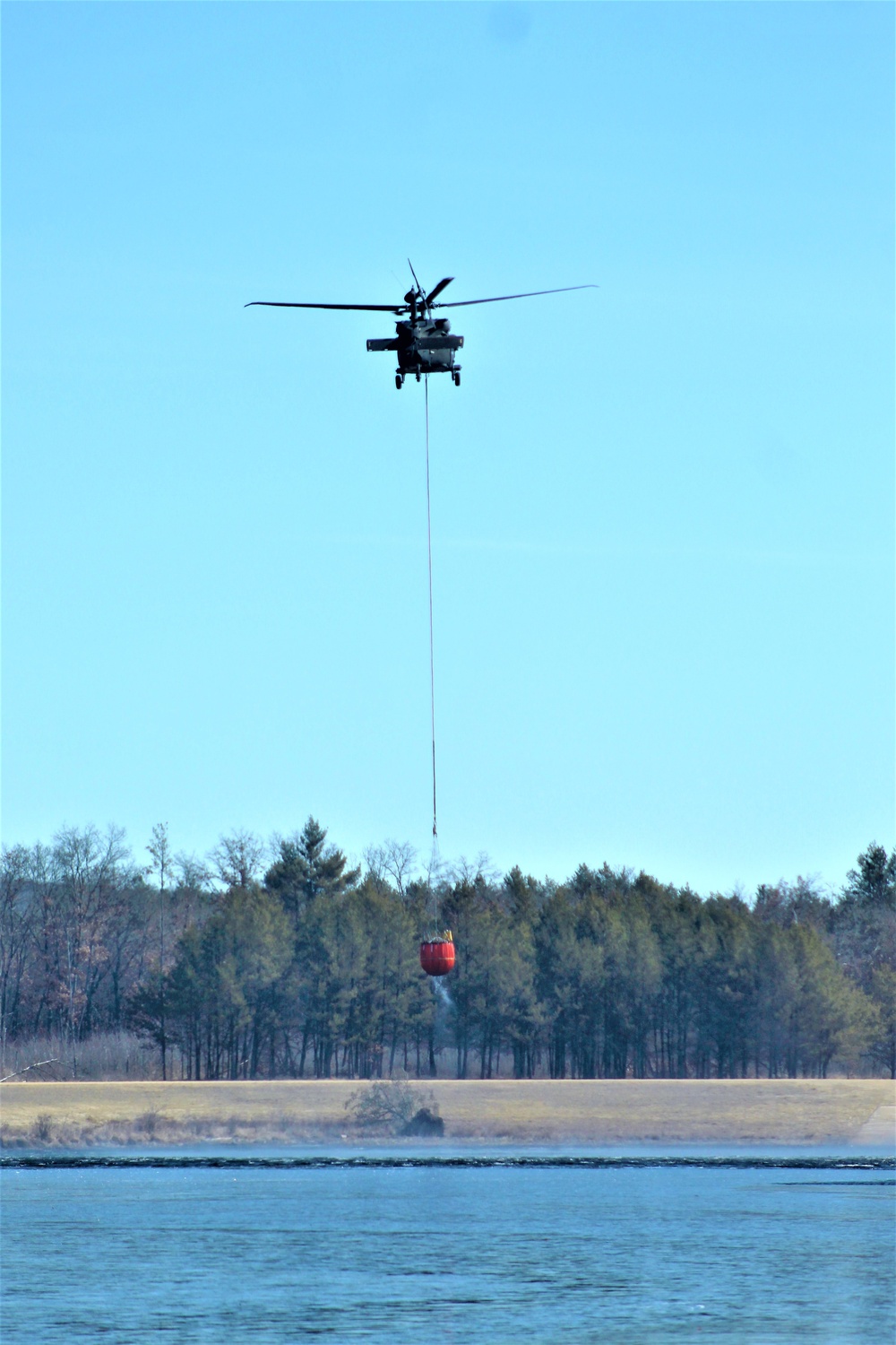 Wisconsin Army National Guard UH-60 Black Hawk crew holds Bambi bucket training at Fort McCoy