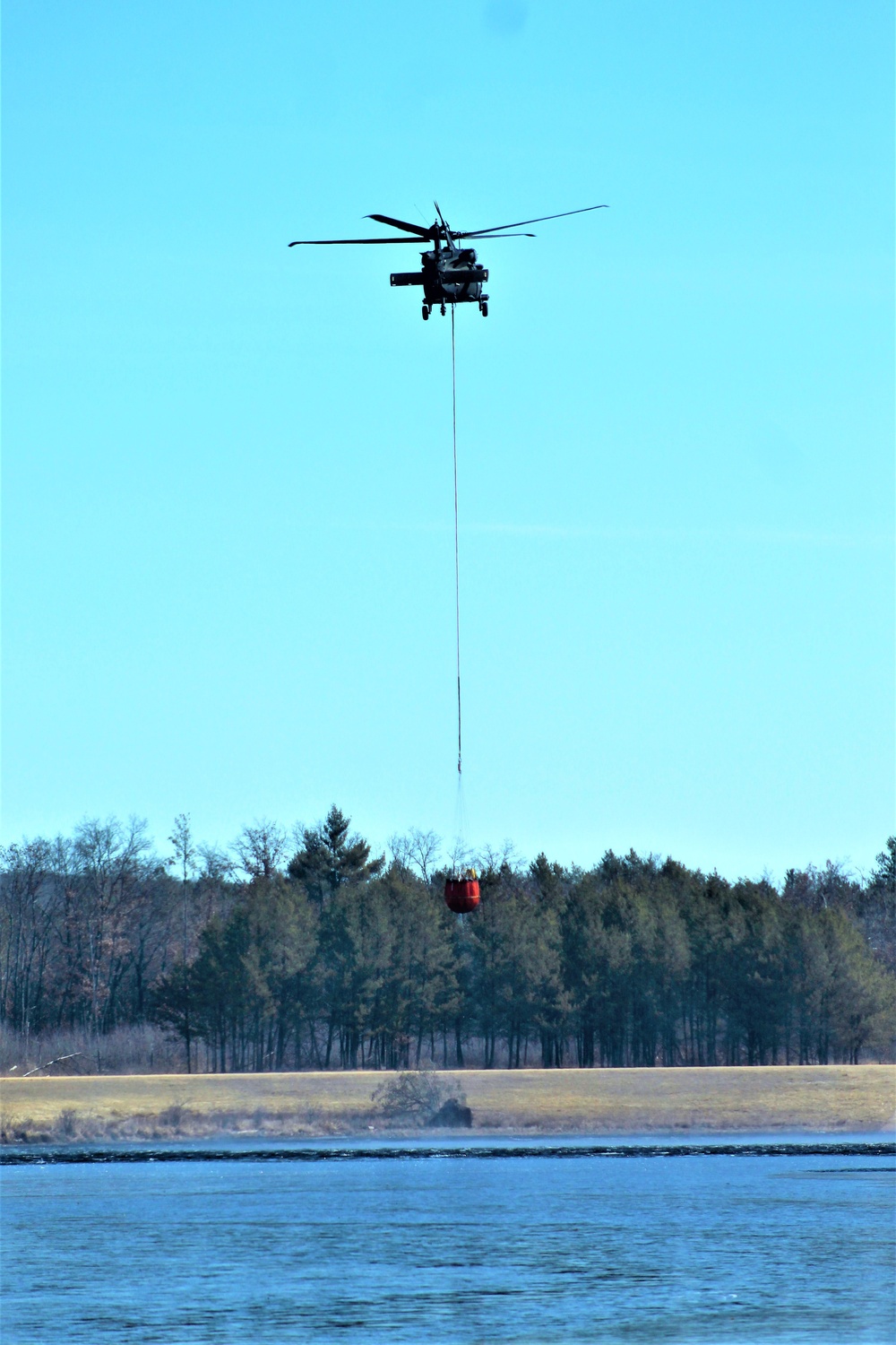 Wisconsin Army National Guard UH-60 Black Hawk crew holds Bambi bucket training at Fort McCoy