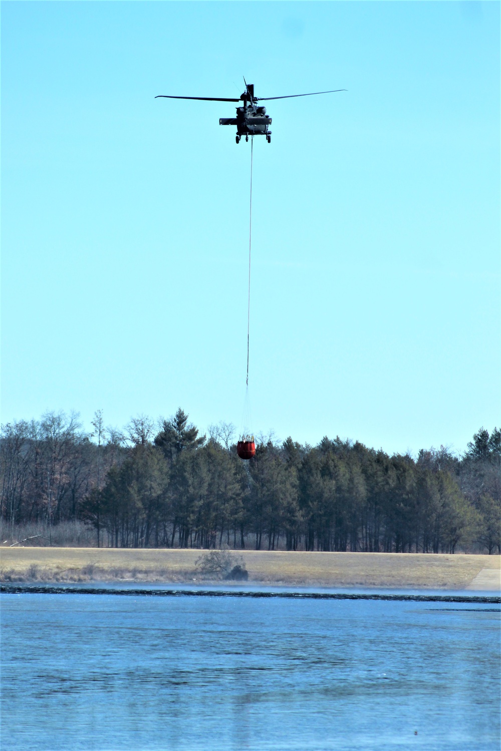 Wisconsin Army National Guard UH-60 Black Hawk crew holds Bambi bucket training at Fort McCoy