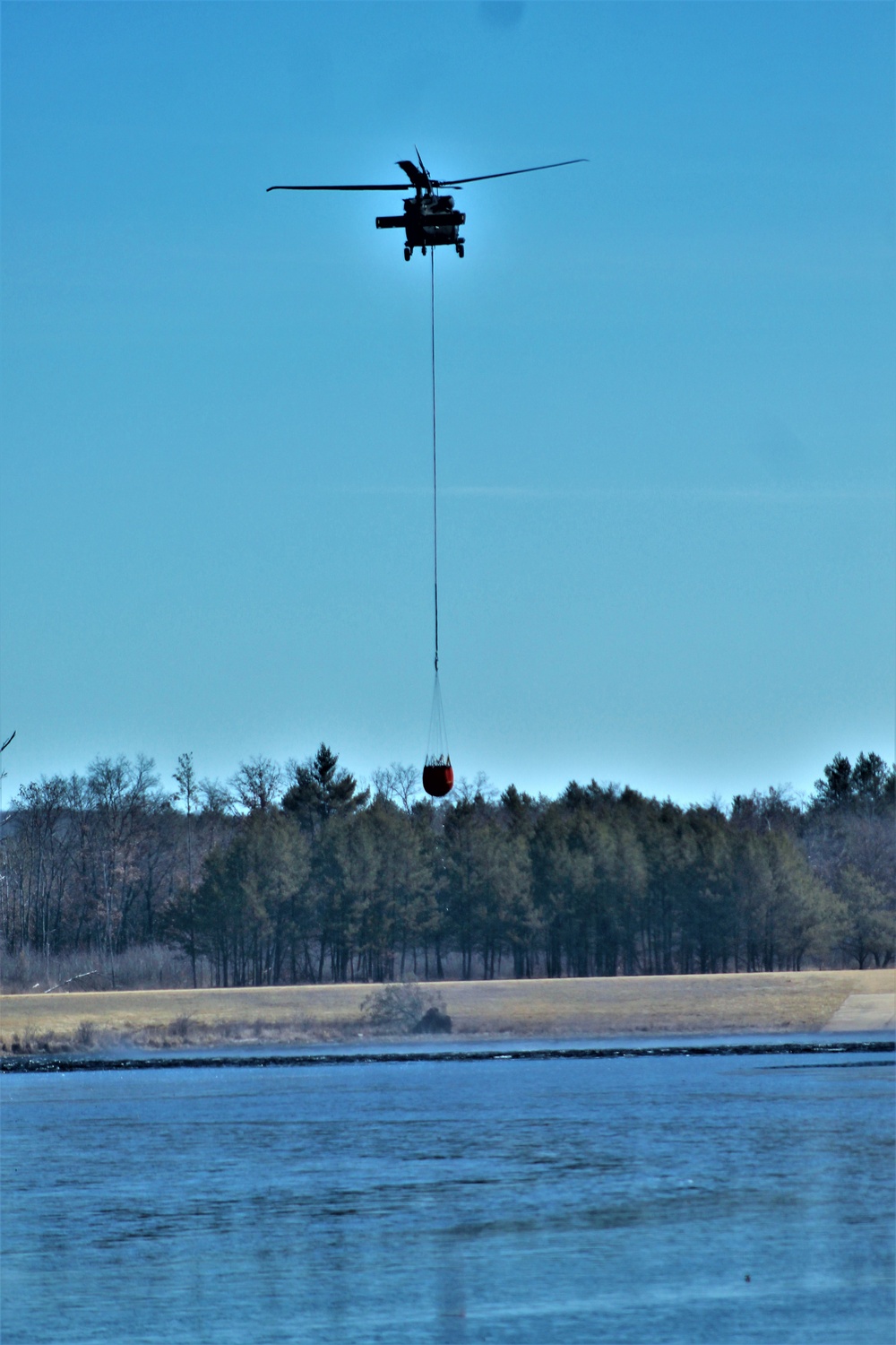 Wisconsin Army National Guard UH-60 Black Hawk crew holds Bambi bucket training at Fort McCoy