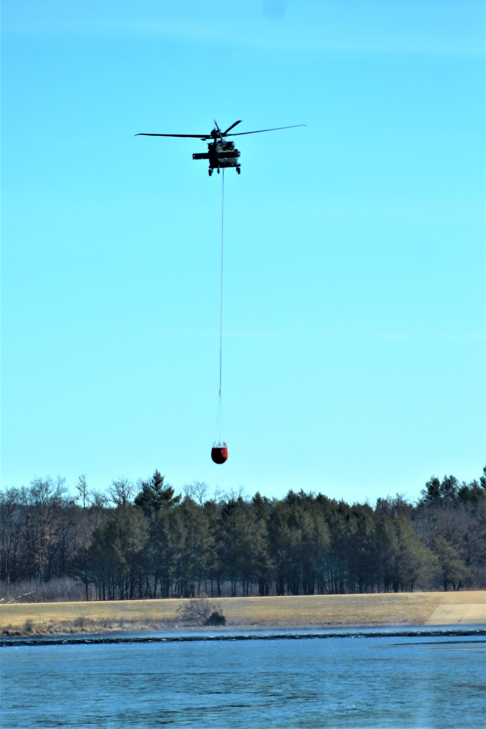 Wisconsin Army National Guard UH-60 Black Hawk crew holds Bambi bucket training at Fort McCoy