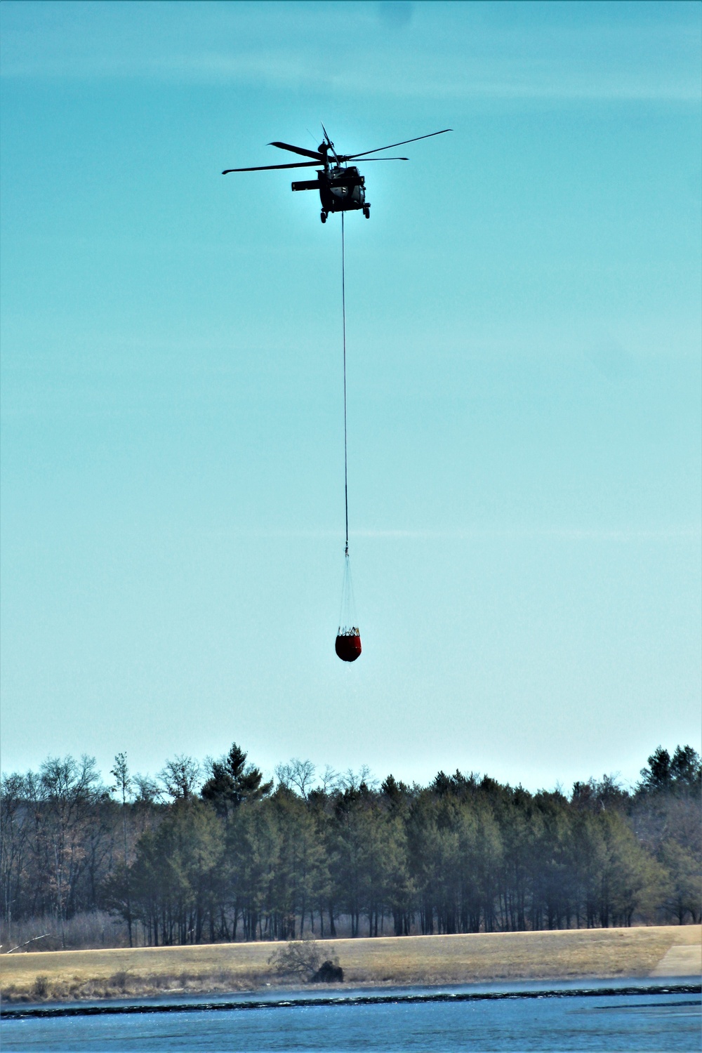 Wisconsin Army National Guard UH-60 Black Hawk crew holds Bambi bucket training at Fort McCoy