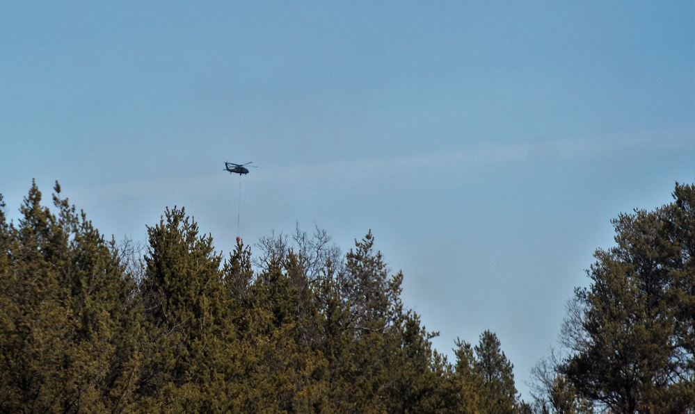 Wisconsin Army National Guard UH-60 Black Hawk crew holds Bambi bucket training at Fort McCoy