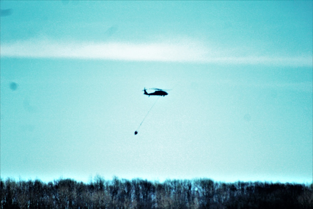 Wisconsin Army National Guard UH-60 Black Hawk crew holds Bambi bucket training at Fort McCoy