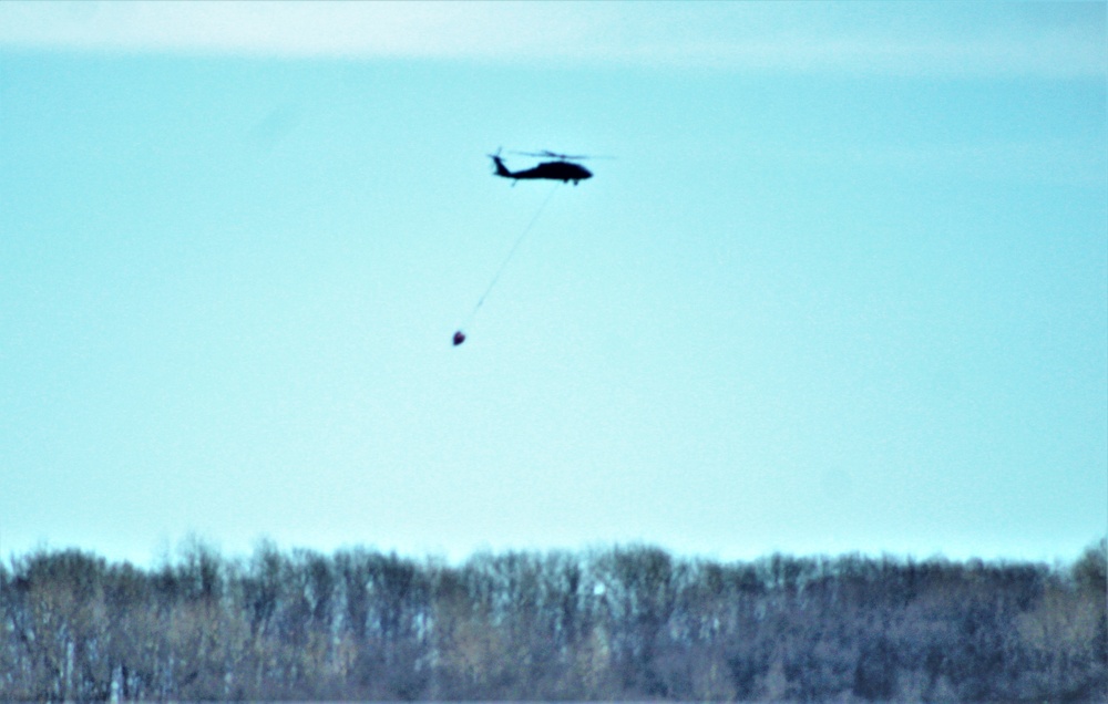 Wisconsin Army National Guard UH-60 Black Hawk crew holds Bambi bucket training at Fort McCoy