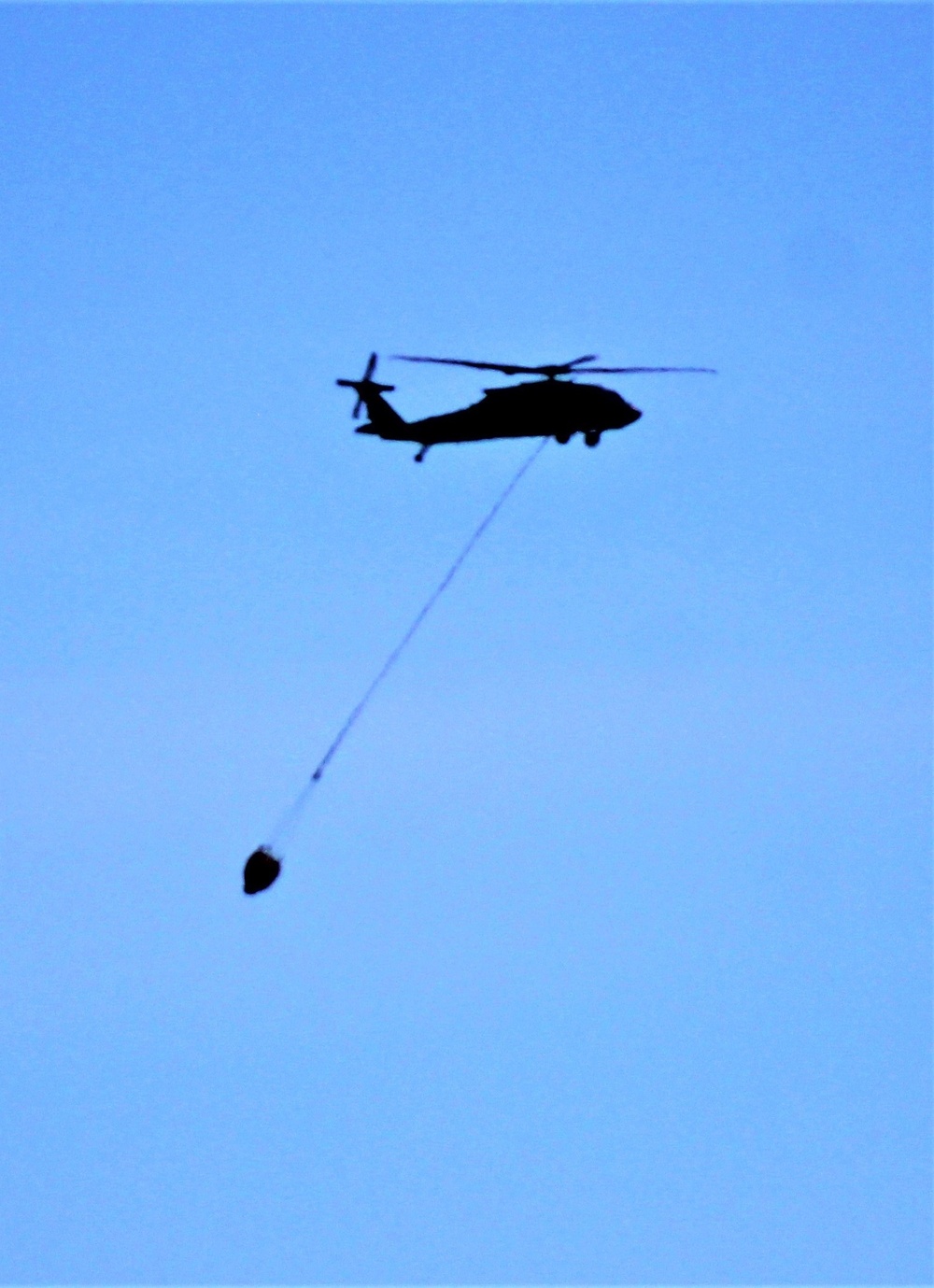 Wisconsin Army National Guard UH-60 Black Hawk crew holds Bambi bucket training at Fort McCoy