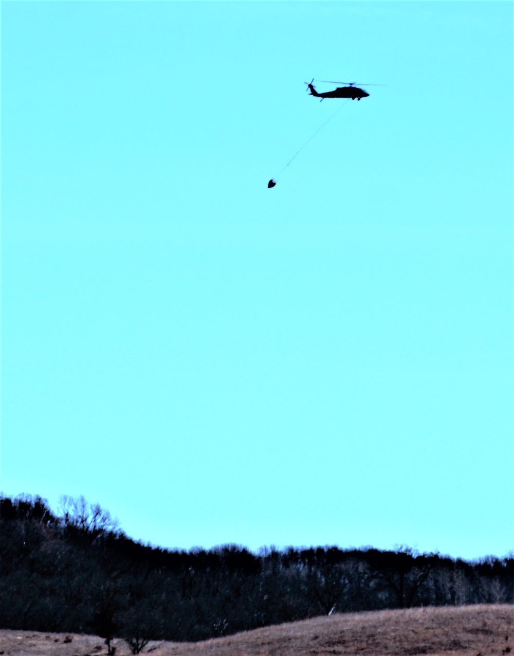 Wisconsin Army National Guard UH-60 Black Hawk crew holds Bambi bucket training at Fort McCoy