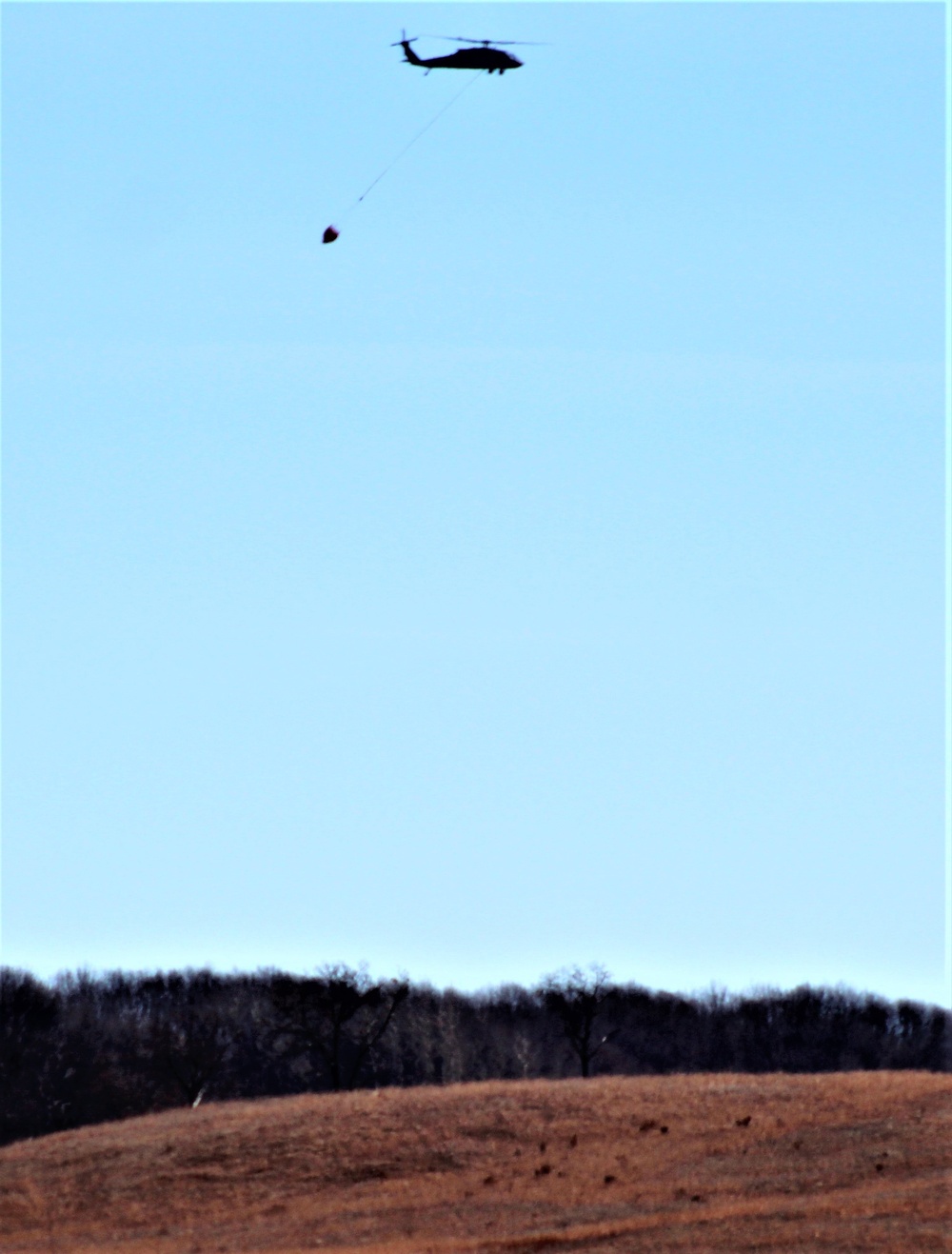 Wisconsin Army National Guard UH-60 Black Hawk crew holds Bambi bucket training at Fort McCoy