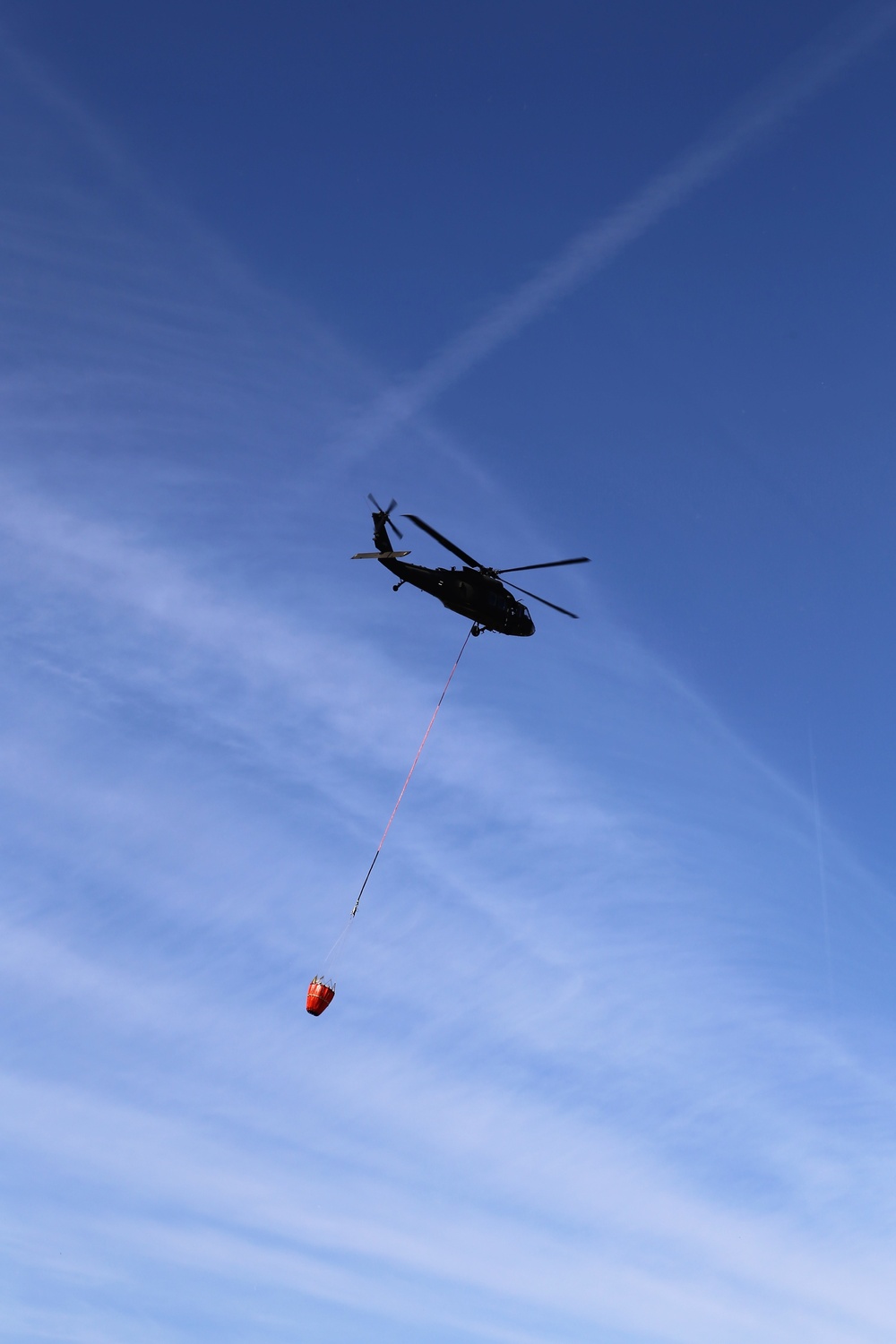 Wisconsin Army National Guard UH-60 Black Hawk crew holds Bambi bucket training at Fort McCoy