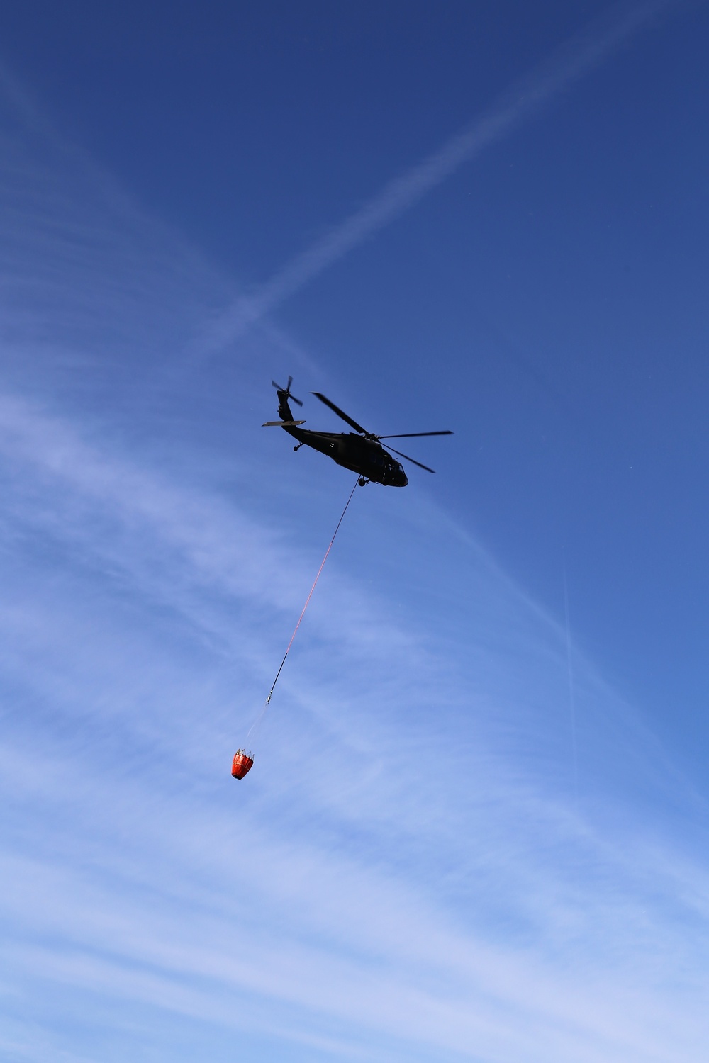 Wisconsin Army National Guard UH-60 Black Hawk crew holds Bambi bucket training at Fort McCoy