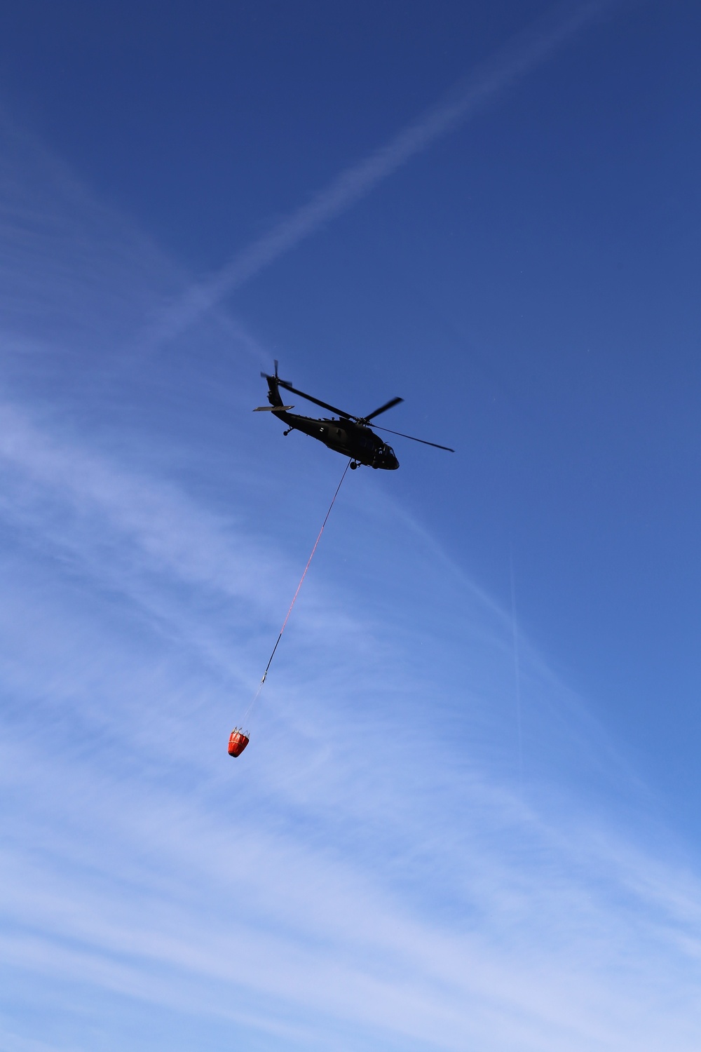 Wisconsin Army National Guard UH-60 Black Hawk crew holds Bambi bucket training at Fort McCoy