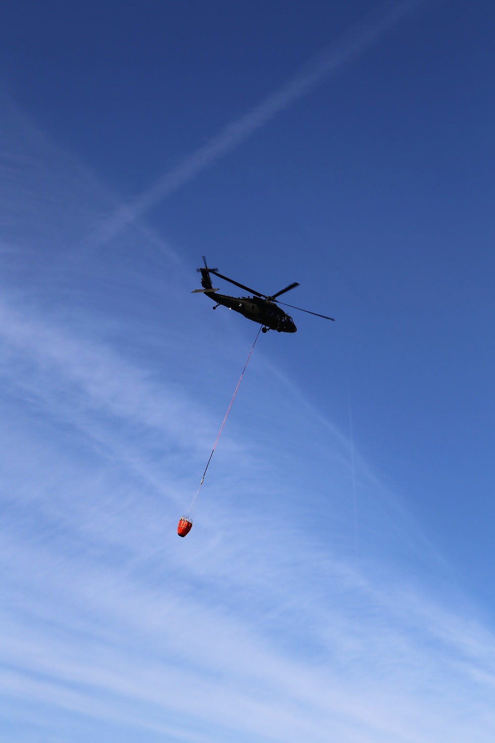 Wisconsin Army National Guard UH-60 Black Hawk crew holds Bambi bucket training at Fort McCoy