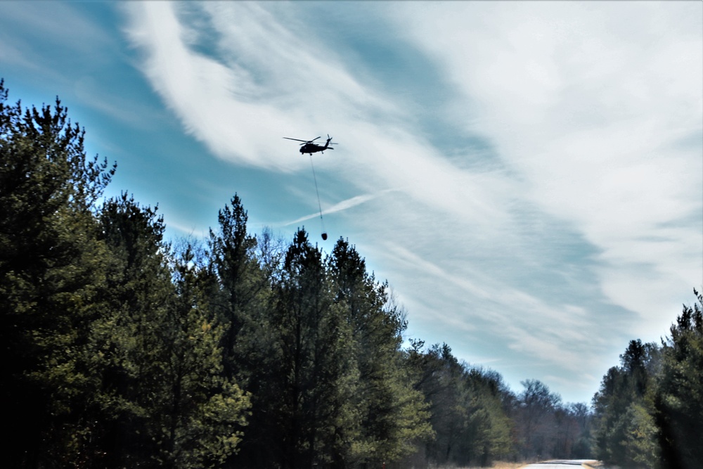 Wisconsin Army National Guard UH-60 Black Hawk crew holds Bambi bucket training at Fort McCoy