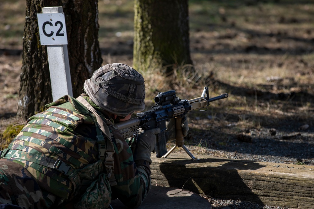 A Dutch Marine aligns his sight