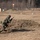 An enlisted Dutch Marine charges forward at the range An enlisted Dutch Marine charges forward at the range