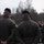 Royal Dutch Marines listen to congratulatory remarks from their command following the successful completion of a speed march. Royal Dutch Marines listen to congratulatory remarks from their command following the successful completion of a speed march.