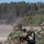 A Dutch Marine pats his fellow enlisted on the shoulder to signal ceasefire A Dutch Marine pats his fellow enlisted on the shoulder to signal ceasefire