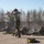 Instructors observe a line of Dutch Marines fire at the range Instructors observe a line of Dutch Marines fire at the range