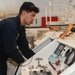 Abraham Lincoln Sailors conduct aircraft maintenance