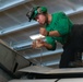 Abraham Lincoln Sailors conduct aircraft maintenance