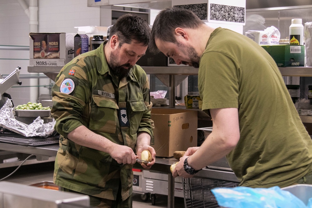 Norwegian Chefs prepare for meal at Camp Ripley