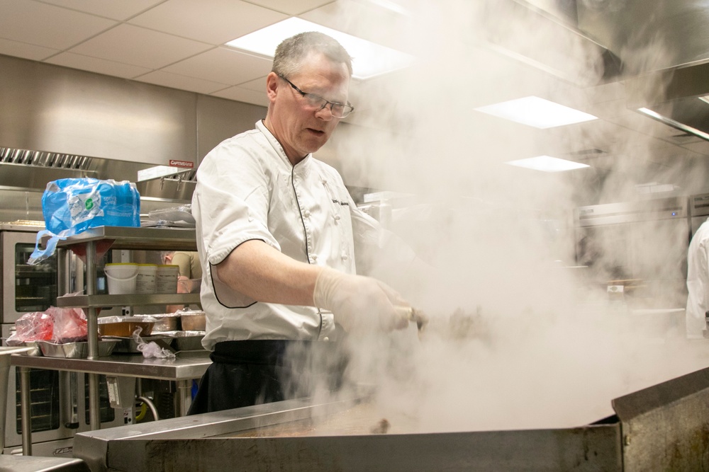 Norwegian Chefs prepare for meal at Camp Ripley