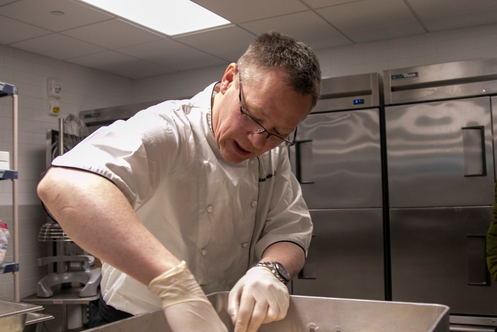 Norwegian Chefs prepare for meal at Camp Ripley