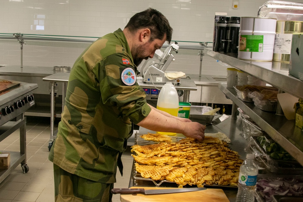 Norwegian Chefs prepare for meal at Camp Ripley