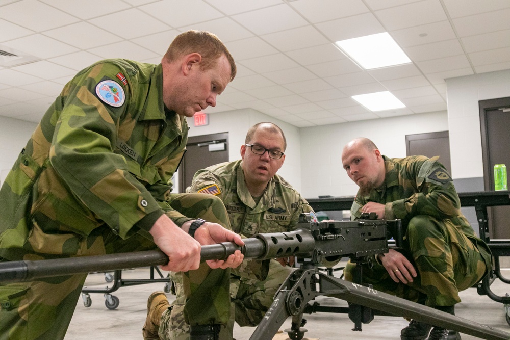 Norwegian Soldiers prepare for crew-served weapons qualification at Camp Ripley