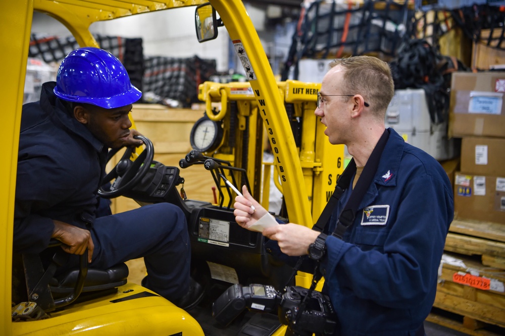 USS Carl Vinson (CVN 70) Sailor Collects Caption Information