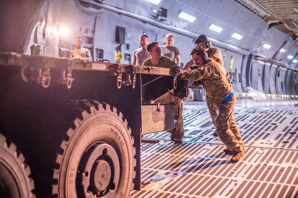 Travis AFB Airmen perform a MSTT mission from Australia to Japan