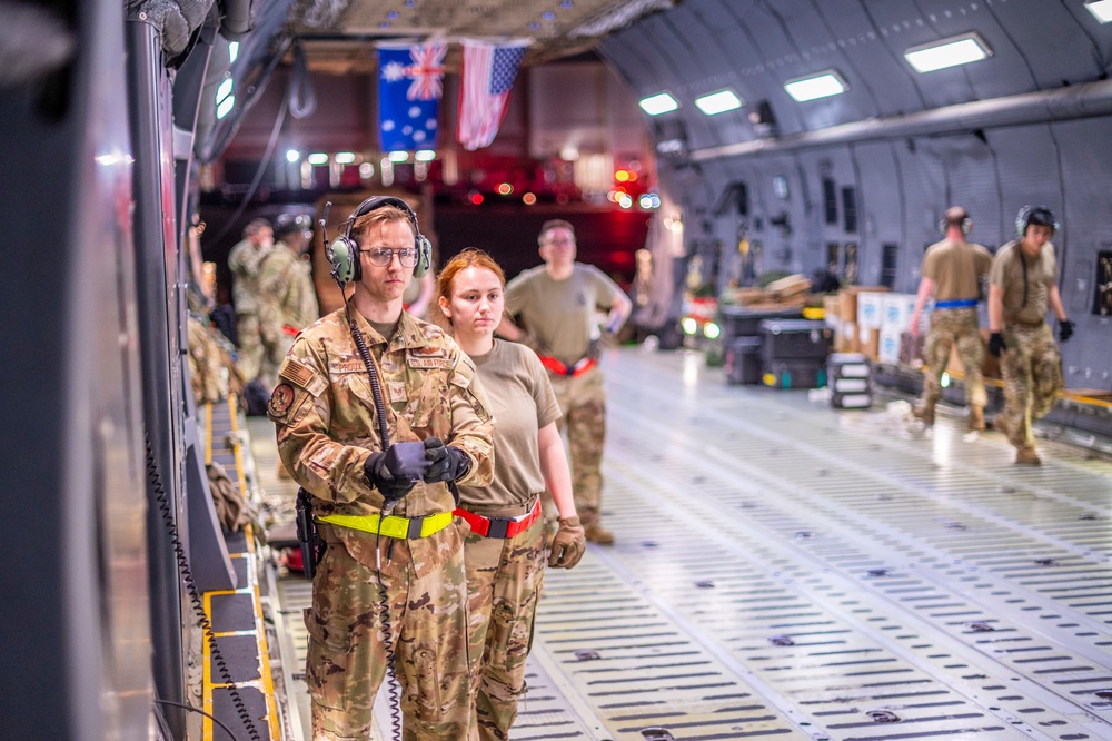 Travis AFB Airmen perform a MSTT mission from Australia to Japan
