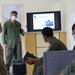 U.S. and Philippine Air Force pilots exchange tactical ideas