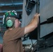 Abraham Lincoln Sailors conduct aircraft maintenance