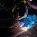 USS Carl Vinson (CVN 70) Sailors Weld Metal