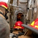 Sailors fight a simulated fire during a firefighting drill aboard Arleigh Burke-class guided-missile destroyer USS Mitscher (DDG 57)