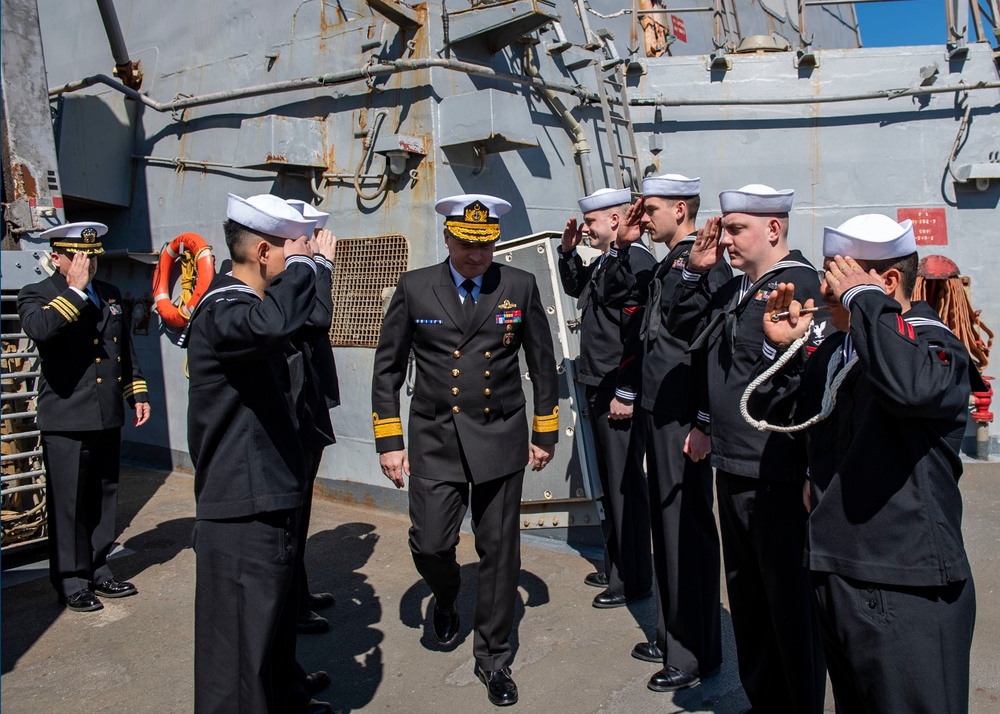 Sideboys aboard Arleigh Burke-class guided-missile destroyer USS Mitscher (DDG 57) render honors as Rear Adm. Mehmet Emre Sezenler, Turkish Navy, commander, South Task Group Command, departs after a ship tour