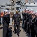 Sideboys aboard Arleigh Burke-class guided-missile destroyer USS Mitscher (DDG 57) render honors as Rear Adm. Mehmet Emre Sezenler, Turkish Navy, commander, South Task Group Command, departs after a ship tour