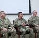 86th Training Division leadership listen to a speaker during the Change of Responsibility ceremony