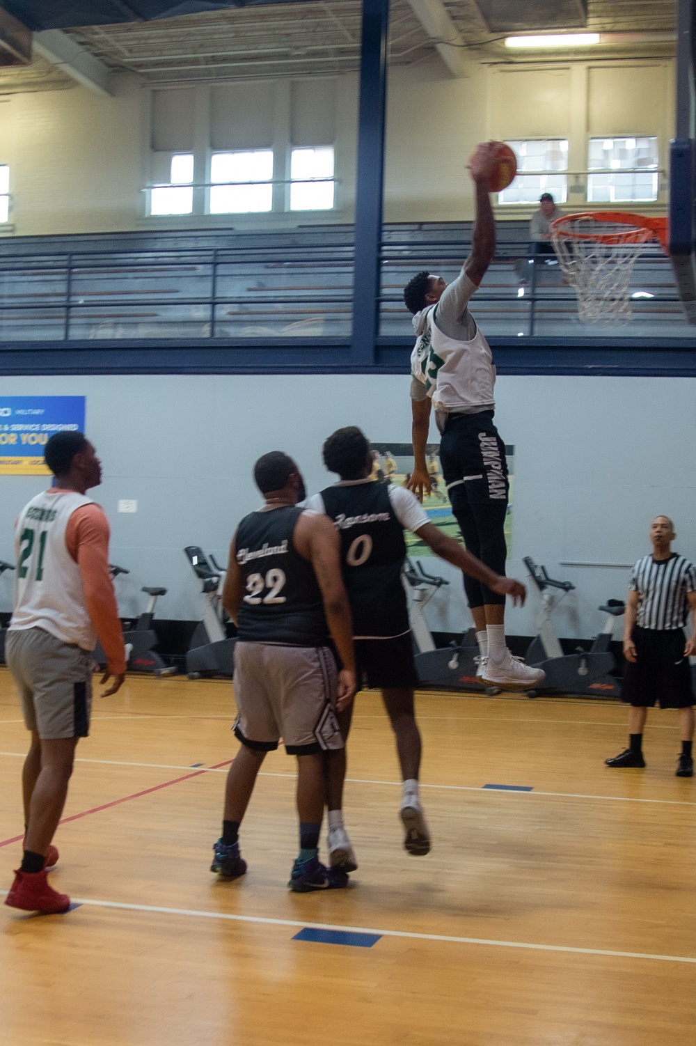 U.S. Navy Sailors, assigned to the aircraft carrier USS John C. Stennis (CVN 74), compete against each other in a Morale, Welfare and Recreation sponsored basketball tournament at Huntington Hall.