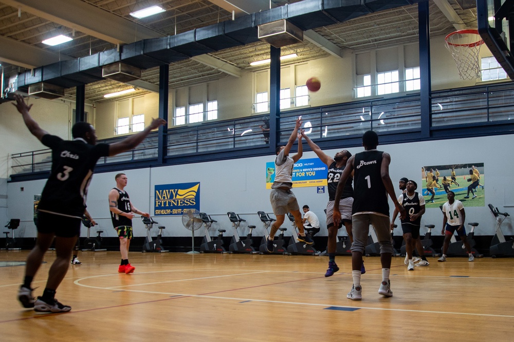 U.S. Navy Sailors, assigned to the aircraft carrier USS John C. Stennis (CVN 74), compete against each other in a Morale, Welfare and Recreation sponsored basketball tournament at Huntington Hall.