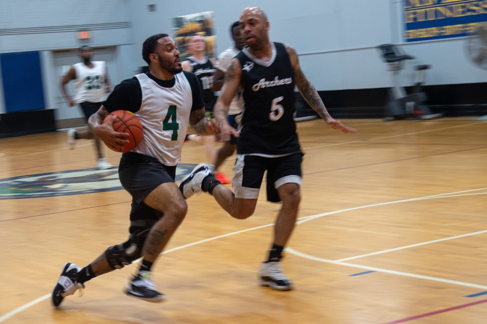 U.S. Navy Sailors, assigned to the aircraft carrier USS John C. Stennis (CVN 74), compete against each other in a Morale, Welfare and Recreation sponsored basketball tournament at Huntington Hall.