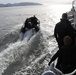 U.S. Coast Guard trains with 1st SFG (A) Green Berets on casualty care, rough water operations near Cape Disappointment