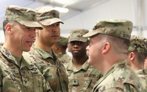 Transportation troops receive their patches in Zagan, Poland.